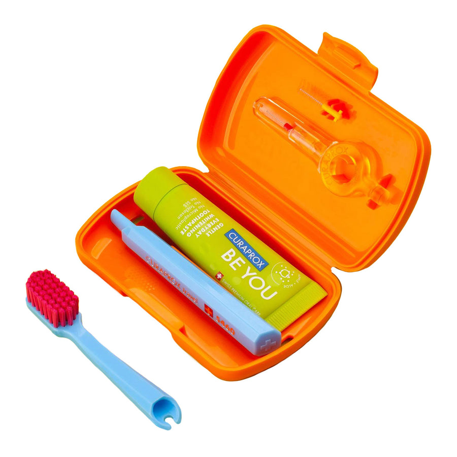 Curaprox Travel-Set Orange. Set includes Travel Toothbrush CS 5460, 10ml Be You Toothpaste, Interdental Brush CPS prime 07, CPS prime 09.